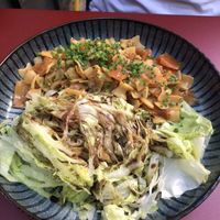 Krautfleckerl - traditional pasta with fried cabbage and side salad   at Cafe Kunst Haus in Vienna