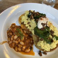 Corn fritters with scrambled tofu and Smokey beans  at Hullabaloo in Ipswich