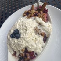 Berry and apple crumble with non dairy whip creamm  at Wild Thyme Cafe in Kanab