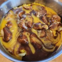 Almost famous bowl smothered in cheese and gravy! To die for. at The Wayside Cafe & Deli in Olympia