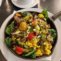 Off menu vegan skillet with added mushrooms and vegan sausage at Lucy's in Grand Rapids