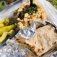 House made Veggie Burger Wrap w/ Quinoa salad. Delicious✨ at HealthyCA in North Hollywood