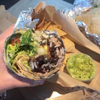 Veggie burrito with chips n guac   at Chipotle - E Cactus Rd in Phoenix