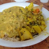Curry, dahl, rice and samosa. at The Mosque Kitchen in Edinburgh