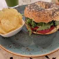 Vegan bagel with beetroot hummus and vegan feta cheese at Socola in Murcia