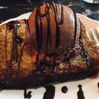 Orange cake with chocolate ice cream - vegan at Bombon in Madrid