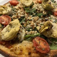 Close up - the roasted pine nuts really make this a home run!   at Polina Pizzeria in Quebec