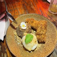 Dessert was super good! With vegan ice cream options. We had lychee and chocolate. Banana was baked with coconut flakes   at Thaitai Brasil in Sao Paulo