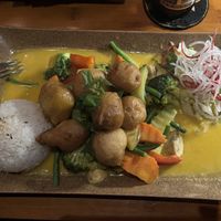 #53 B; rice, veggies in mango sauce with vegan chicken balls  at Mom's Creation - Friedrichshain in Berlin