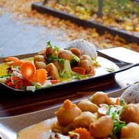 Fried vegan chicken with mango sauce and peanut sauce at Mom's Creation - Friedrichshain in Berlin