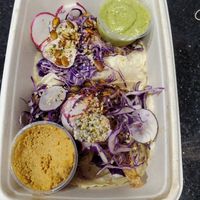 Cauliflower Tacos with side sauces. at The Nest in Ojai