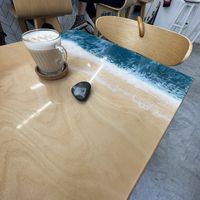 Table tops done by the surfboard maker   at Coffee & Waves in Lagos