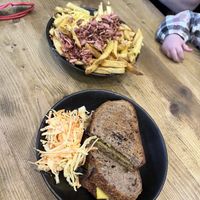 Chicken and pesto toastie with a side of cheese and bacon loaded fries   at Megafauna in Southport
