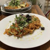 Rosé pasta topped with microgreens and black olives at Nammi Plant Lab in Seoul