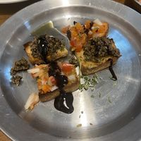 Free tomato and olive bruschetta   at Nammi Plant Lab in Seoul