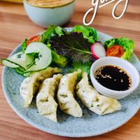 I had this amazing vegetable gyoza and a great cup of coffee. at Roots Cafe in Abergele