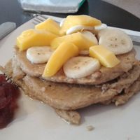 Vegan oat based pancake with Maple syrup on top at Cafe Eh Eh in Vang Vieng