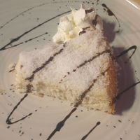 Delicious coconut pie - not vegan, but they always exchange the dessert of the day for a vegan option. at Casa Brasil in Palavas-les-flots