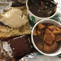 Cornbread, ribs, collard greens, yams  at Trio Plant-Based in Minneapolis