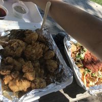 Amazing lemon pepper wings and walnut meat nachos at Trio Plant-Based in Minneapolis