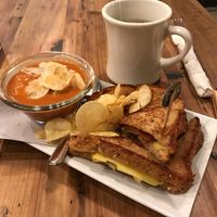 Grilled ham & cheese, and tomato soup at Trio Plant-Based in Minneapolis