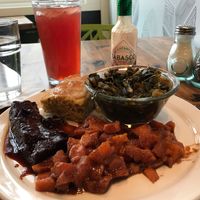 Soul food platter - sweet potatoes, bbq ribs, collards, corn bread at Trio Plant-Based in Minneapolis
