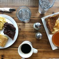 Ham and cheese with tomato soup and he soul food platter! at Trio Plant-Based in Minneapolis