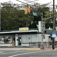 Parking in front; picnic tables on the rightt  at Luna Verde Vegan Mexican Restaurant in Bradley Beach