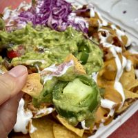 Huge portion of delicious nachos   at Luna Verde Vegan Mexican Restaurant in Bradley Beach