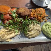 Startes platter with avo & eggplant spread and hummus, couscous, veggies…, plus jam for the sweet itch (not normally part of the dish)  at An-Do in Vienna