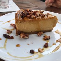 Pumpkin cheesecake with graham cracker crust and pecan crumble. at Revolution Winery and Kitchen in Sacramento