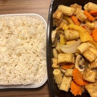Baby corn stir fry with tofu and rice  at Thailand Restaurant in Columbia
