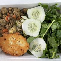 Bowl of the day: tutu, calaloo stew, soya stew, peas crochet, and salad  at Freedom Fighters Ital Shack in Philipsburg