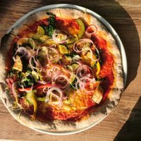 Vegan pizza with vegan cheese at Carl-Zone in Strobl