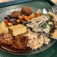 Falafel, tempeh, tofu, Baja rice, roasted veg and pesto pizza   at Green Cuisine Vegetarian Restaurant in Victoria