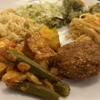 Quinoa cake, tofu, veg and cold salads  at Green Cuisine Vegetarian Restaurant in Victoria