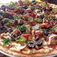 Super delishh smoked bbq tempeh pizza at Bean Me Up in Goa