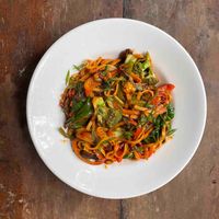 Drunken udon noodles in a chilly basil sauce with lots of veggies.  at Bean Me Up in Goa