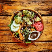 Creamy Hass avocados in pumpkin and sunflower seeds.  at Bean Me Up in Goa