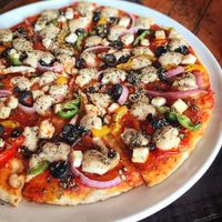 veggie pizza w vegan cheese yummm at Bean Me Up in Goa