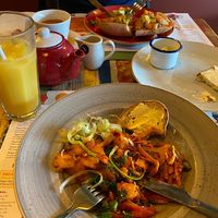 My vegan bacon hash, and my boyfriend’s avocado brunch   at Lounges - Otto Lounge  in Heswall