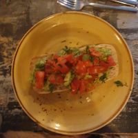 Vegan Smashed Avocado Brunch: Edamame guacamole, chipotle tomato salsa, Aleppo chilli, coriander and lime on toasted ciabatta. at Unico Lounge  in Wilmslow