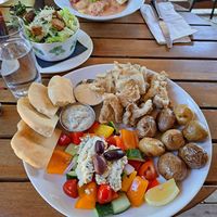 Greek goddess plate in front, ravioli and Ceasar salad in back at Eve Olive in Nanaimo