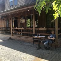 Outside seating. Cute!  at Eve Olive in Nanaimo