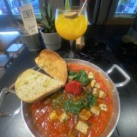 Vegan shakshuka and kombucha cocktail (non-alcoholic)  at Zenith in Lisbon