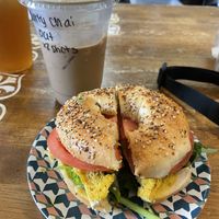 Double dirty chai w oat milk and the vegan breakfast sam on an everything bagel   at Shanahan's Coffee House in Mukwonago