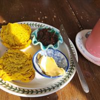 Cheese scone chutney and flat white at Cafe Carmel in Bacton