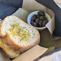Garlic bread and olives at Aubergine Cafe in Corfu
