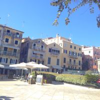 A view of the cafe and plaza seating area. at Aubergine Cafe in Corfu