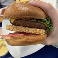 Omega burger with pickled onion  at Meta Burger in Denver